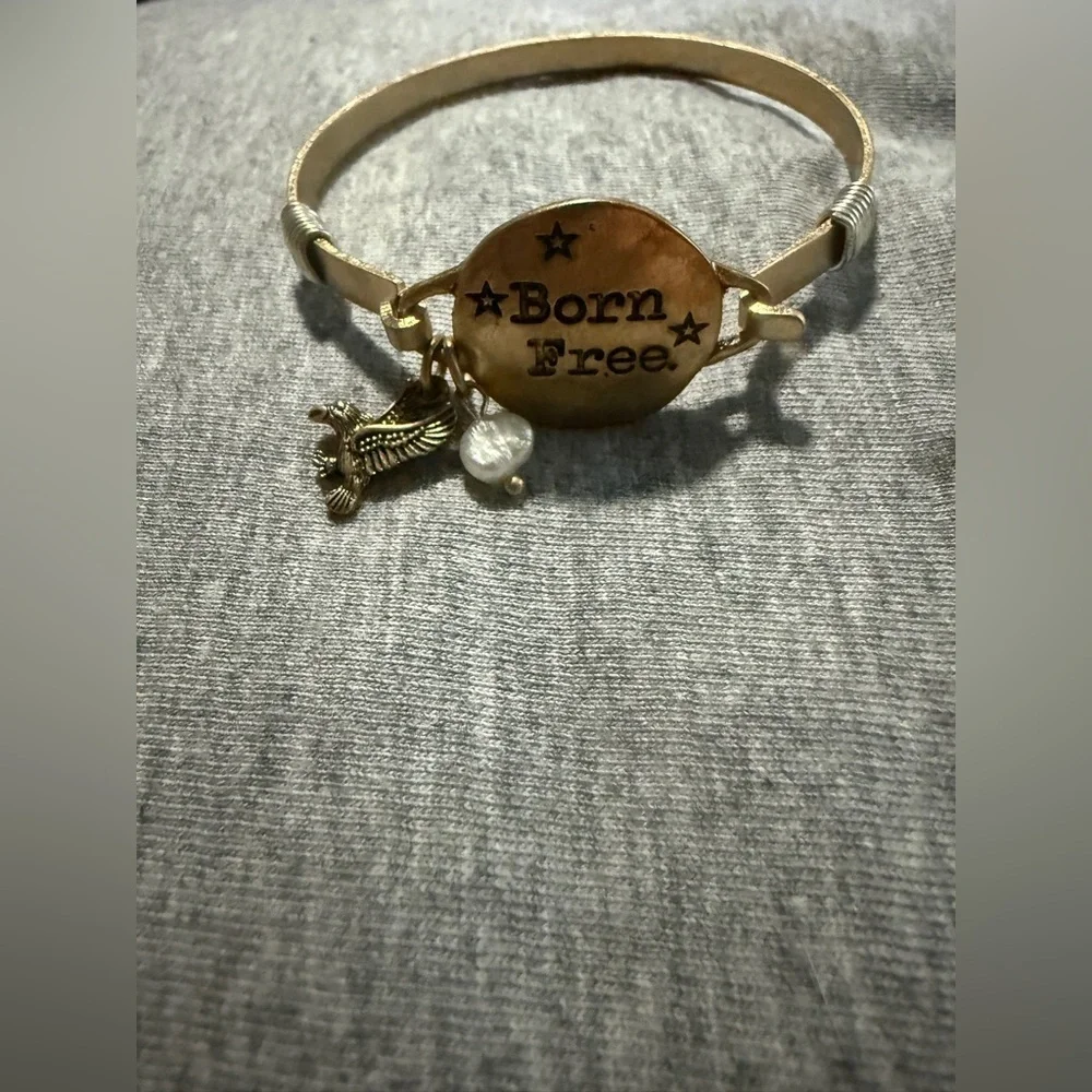 Gold 'Born Free' Bracelet with Charms